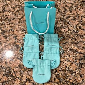 5 Tiffany dust bags & paper bag